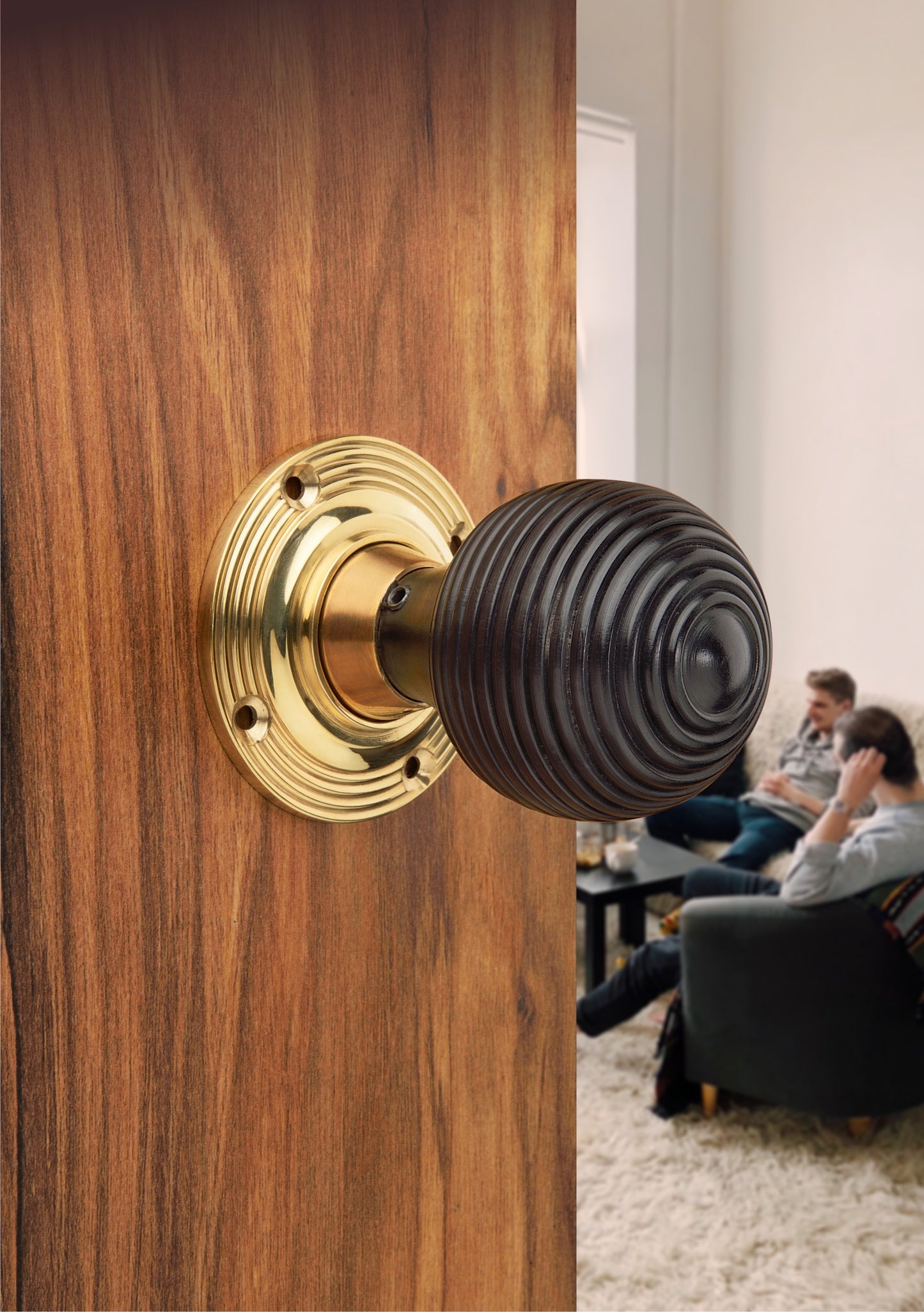 Ebony Beehive Rim/Mortice Door Knob Polished Brass